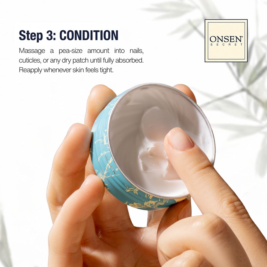 Hand holding a small container of cream with Onsen Secret branding.