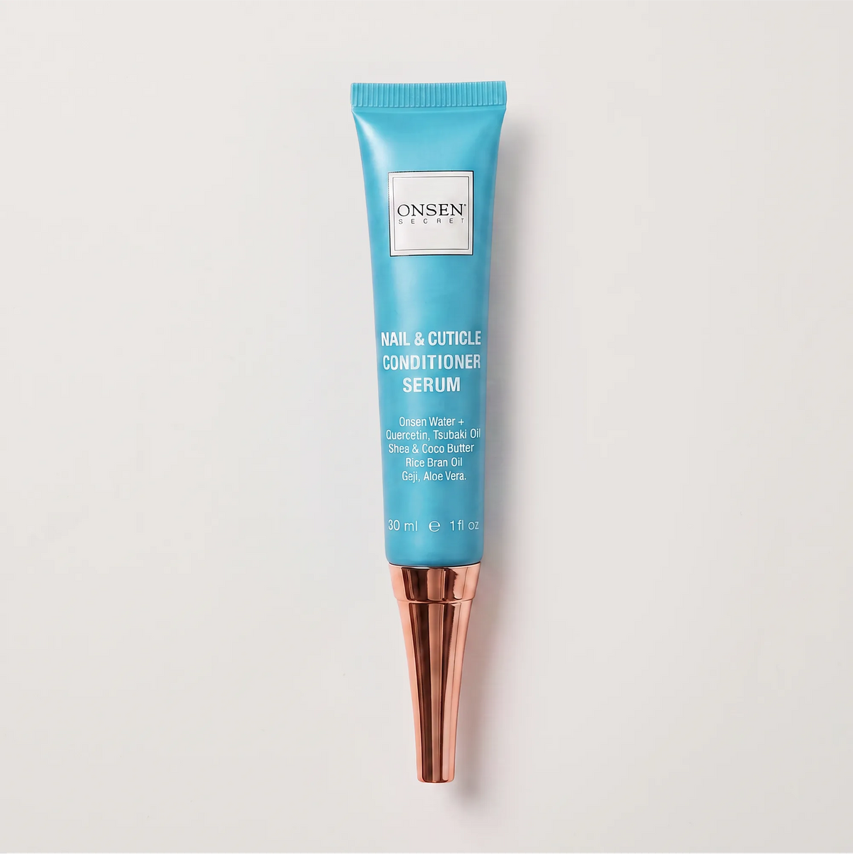 Skincare product visual of Onsen Secret nail and cuticle serum, 30ml tube with quercetin, tsubaki oil, shea butter, and aloe vera.