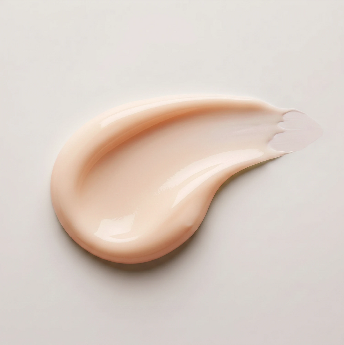 Onsen Secret wrinkle release syringe texture, luminous cream smear showcasing targeted formula for fine lines.