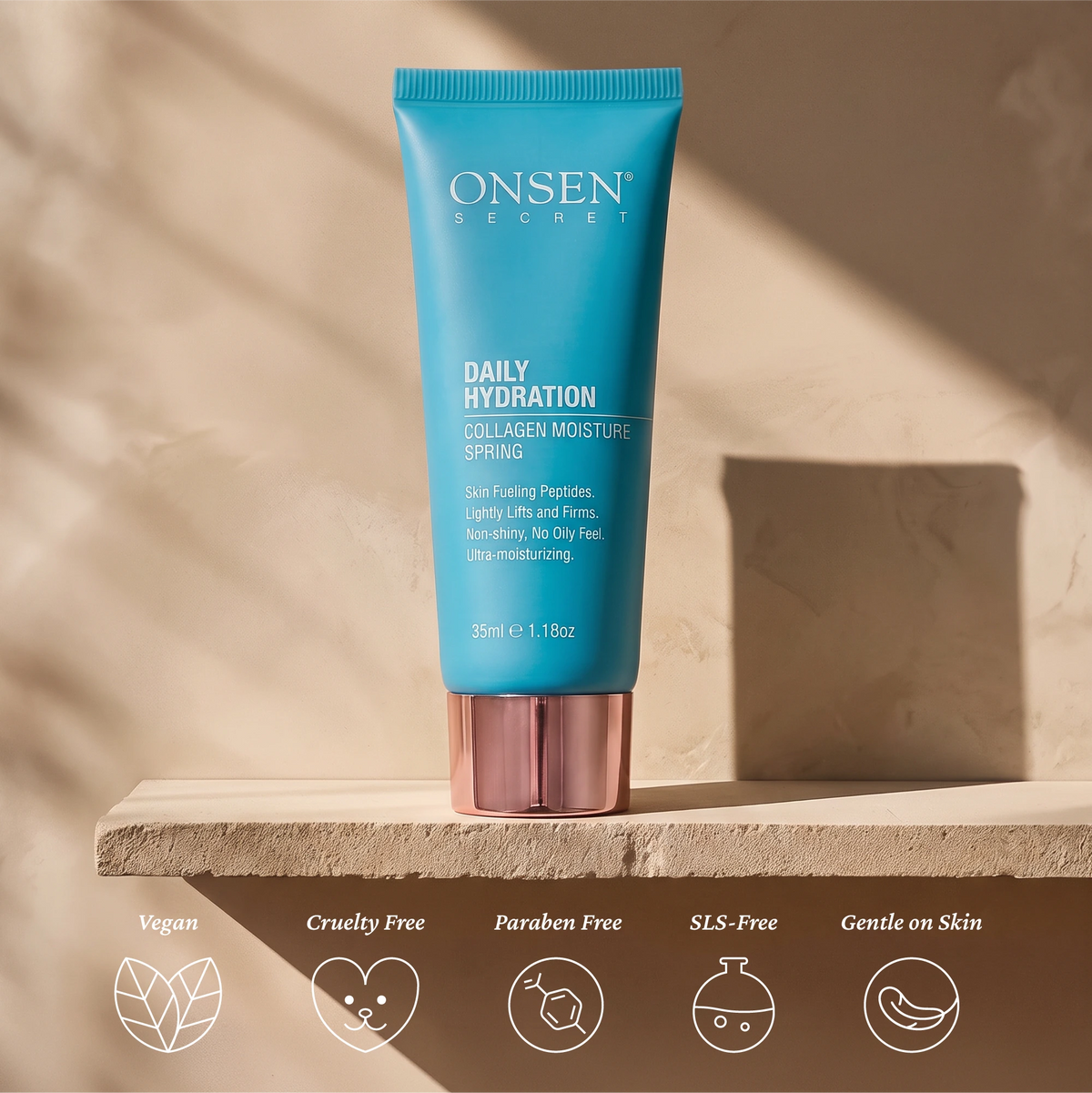 Skincare product visual of Onsen Secret collagen moisturizer, 1.18oz hydration tube with eco‑friendly icons for vegan, cruelty free, sulfate free, paraben free, and gentle formula.