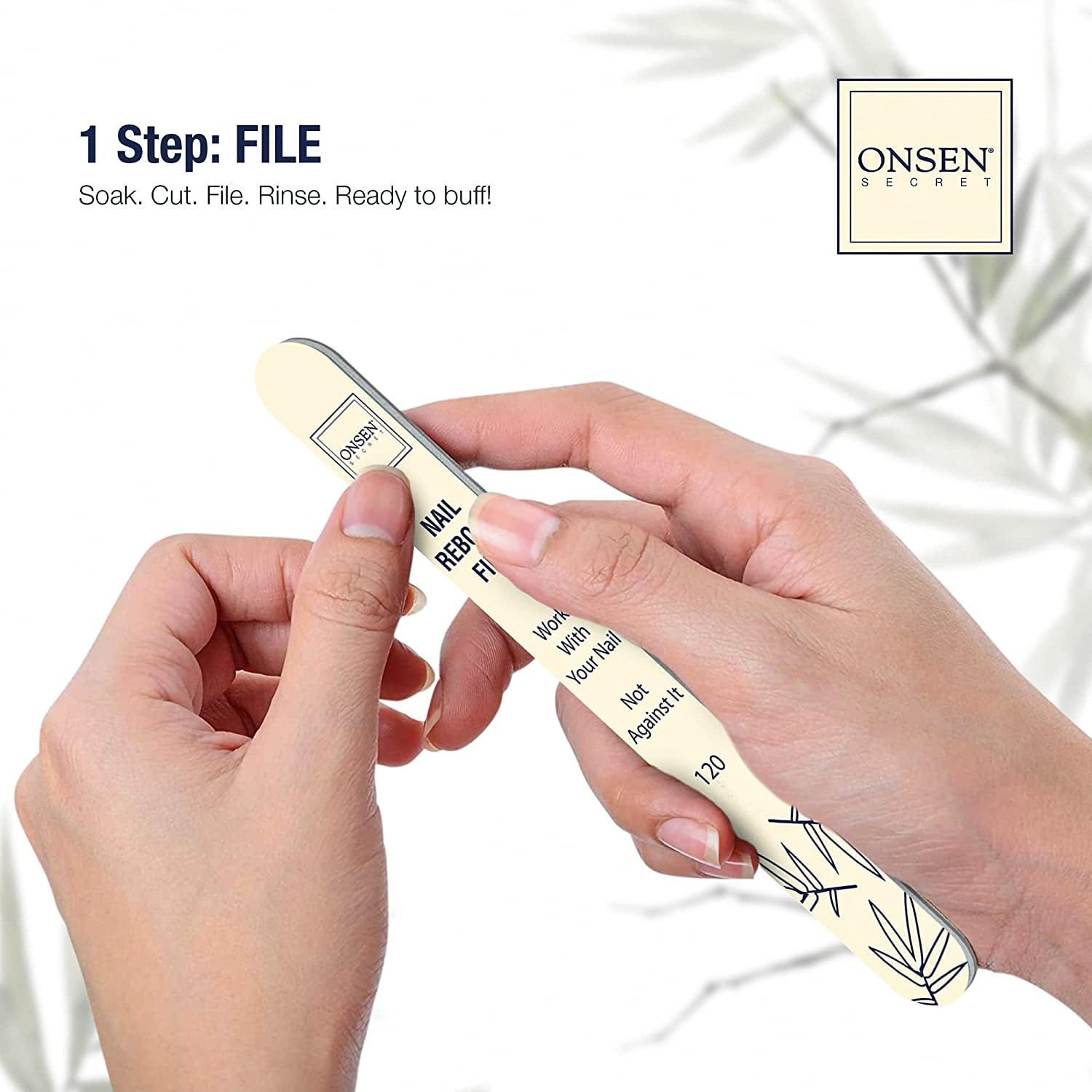 Onsen Secret nail file being held by a hand with a white background
