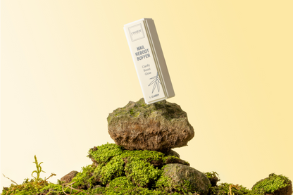 Product packaging on a rock with a natural background