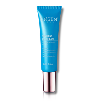 A jar of ONSEN Soothing Eye Cream with a blue label, reflective surface, and the text &