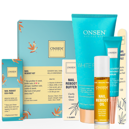 A collection of nail care products from Onsen Secret including a nail &amp; cuticle conditioning serum, nail reboot oil, a 3-way shining buffer block with replacement pads, nail reboot file, and a white pagoda hand cream, all laid out on a light background.